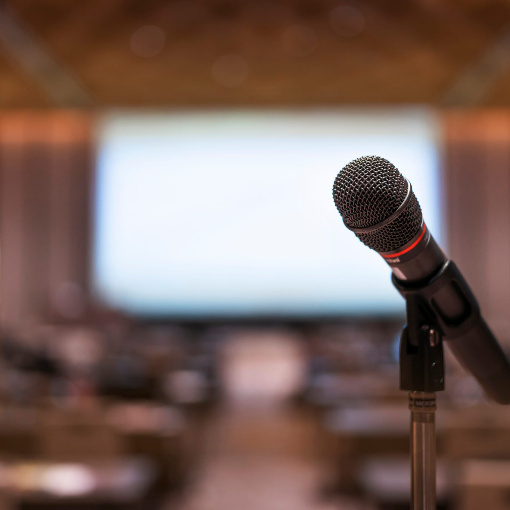 a microphone in front of a crowd